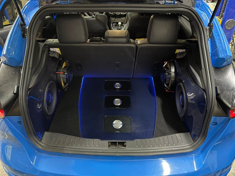 Blue hatchback custom audio installation